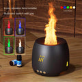 Black flame humidifier with colorful simulation flames on a wooden surface