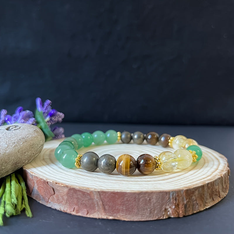 Multicolored beaded bracelet on a wooden surface with a dark background
