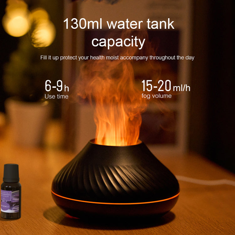 Black essential oil diffuser with flames on a wooden surface, showing product details.
