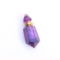 Purple crystal-shaped bottle with gold cap on a white background