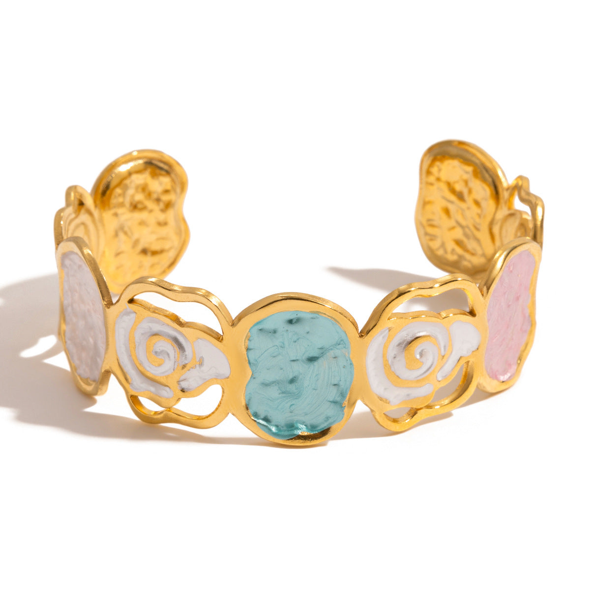 Gold bracelet with pastel-colored stones on a white background