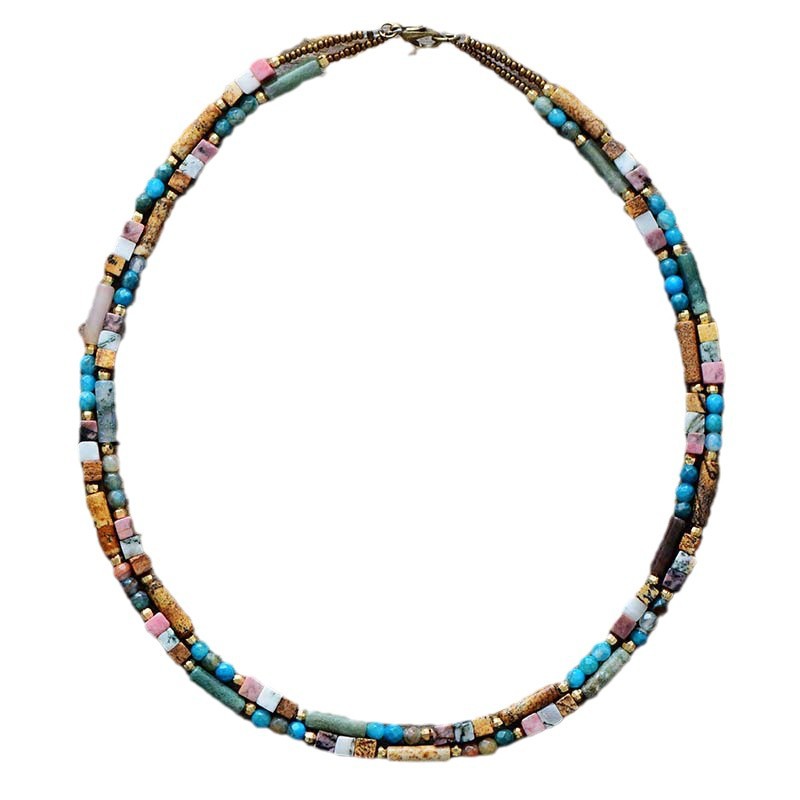 Multicolored beaded necklace on a white background
