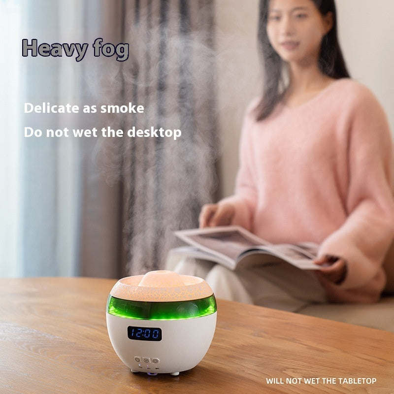 Humidifier emitting mist on a table with a woman reading a book in the background