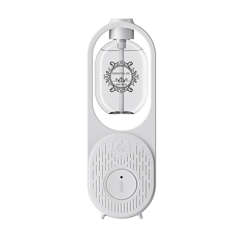 White essential oil diffuser with clear top on a white background