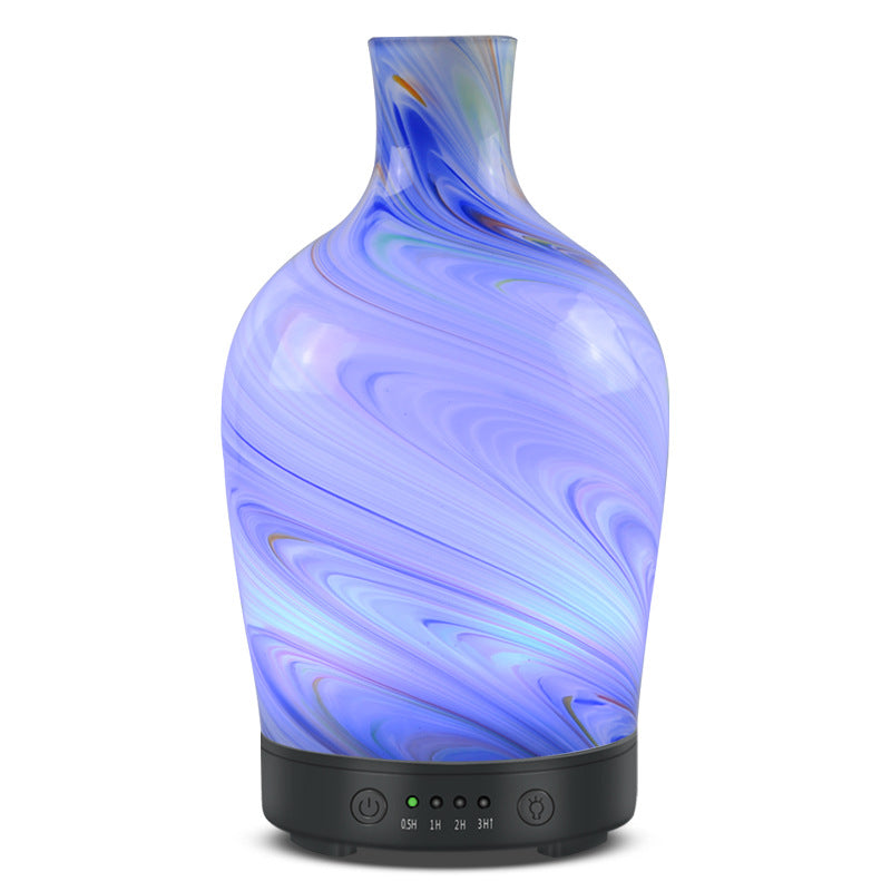 Decorative diffuser with swirling blue and purple design on a white background