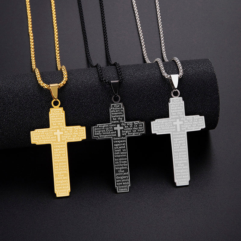 Three cross necklaces in gold, black, and silver on a dark background