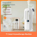 T1 Smart Aromatherapy Machine with digital display and essential oil bottle on a blurred background