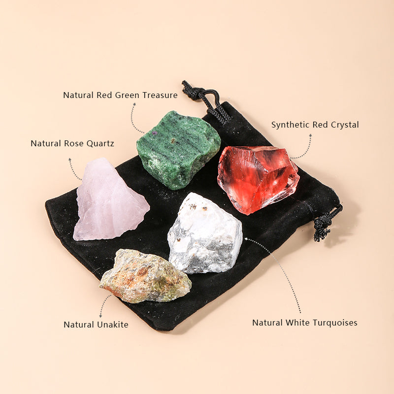 Collection of various crystals on a black mat with labels on a beige background