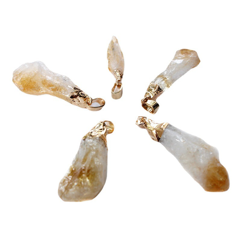 Five gold-trimmed stone pendants on a white background