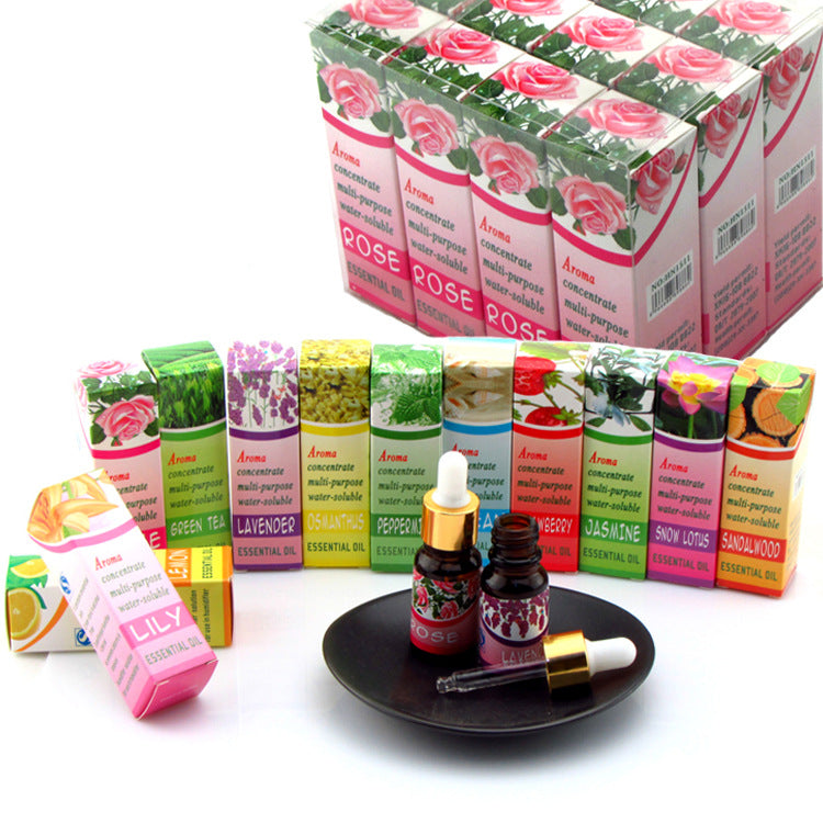 Collection of Aroma essential oil boxes and bottles on a white background