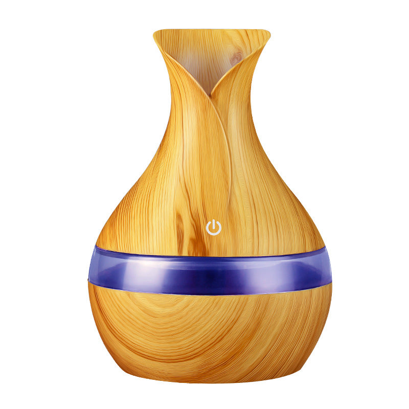 Wooden-textured diffuser with a power symbol on a white background