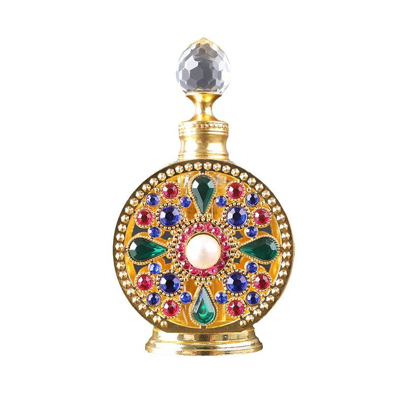 Decorative perfume bottle with colorful gemstones on a white background