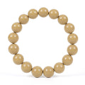 Beige wooden beaded bracelet on a white background