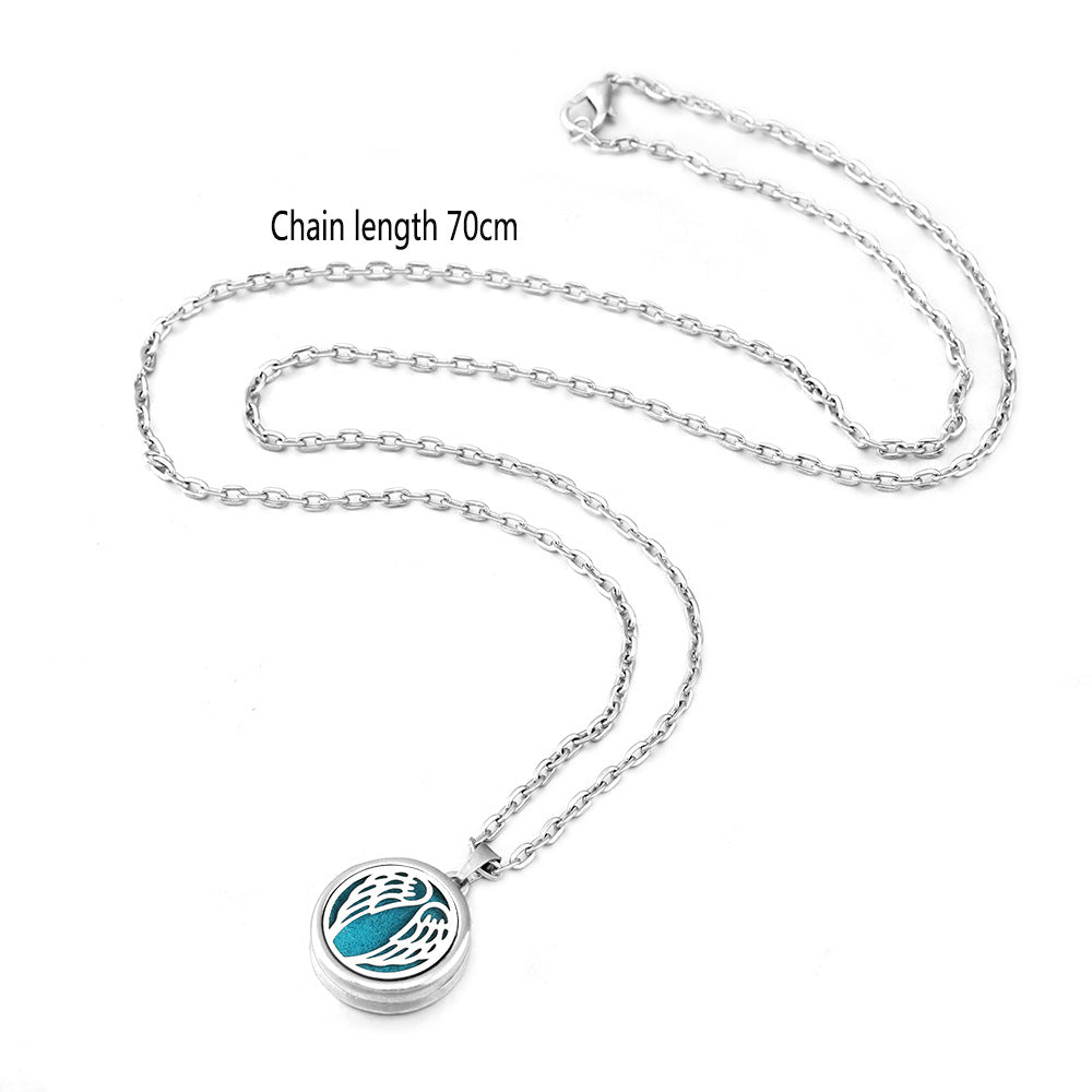 Silver necklace with a blue pendant on a white background