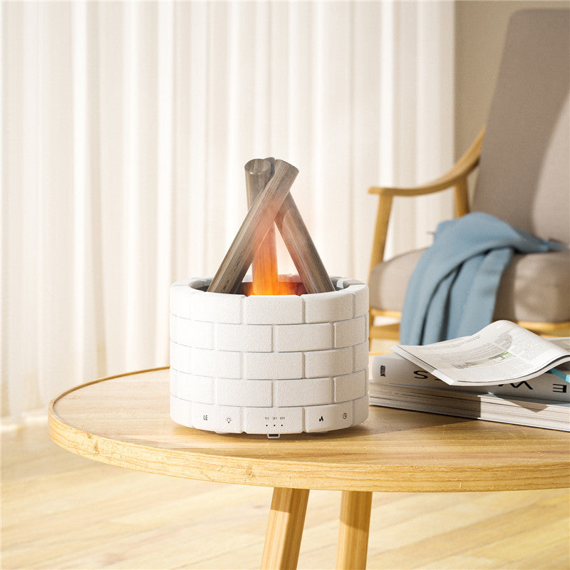Portable indoor fire pit on a wooden table with a cozy living room background