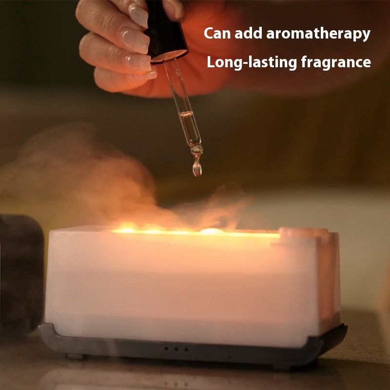 Hand dropping oil into a diffuser with text about aromatherapy and long-lasting fragrance.