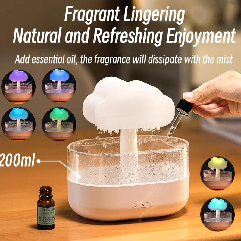 Humidifier with essential oil bottle and cloud-shaped diffuser on a wooden surface.