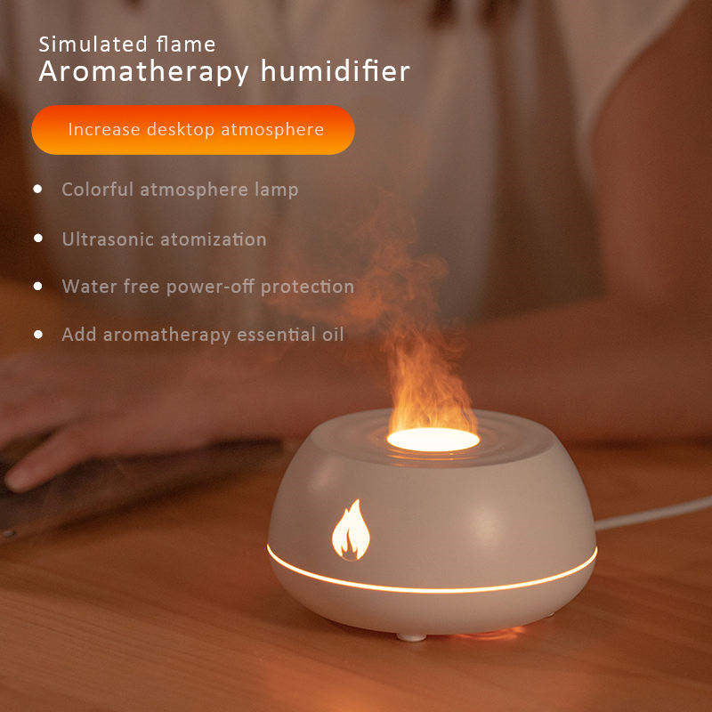 Aromatherapy humidifier with simulated flame on a wooden surface, featuring text about its features.