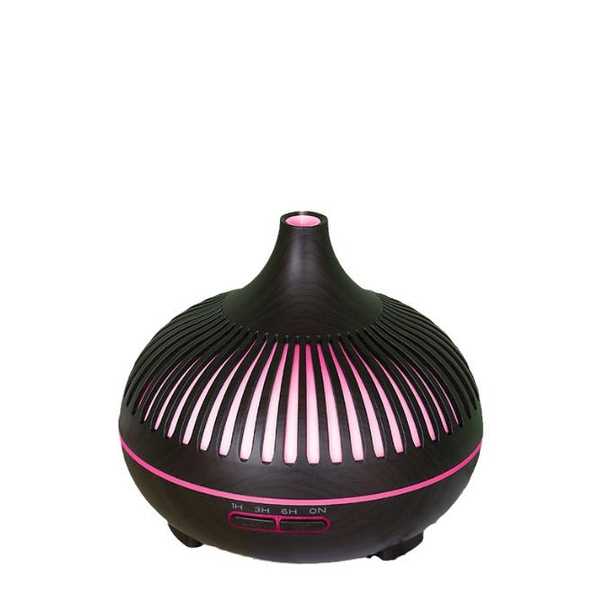 Black and pink humidifier on a white background