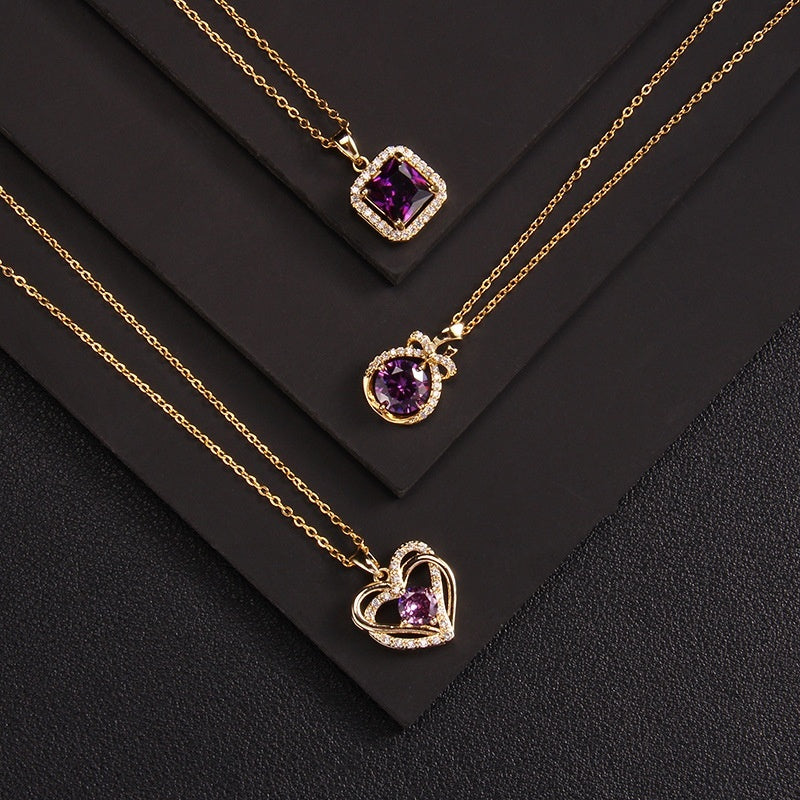 Gold necklaces with purple gemstone pendants on a black background