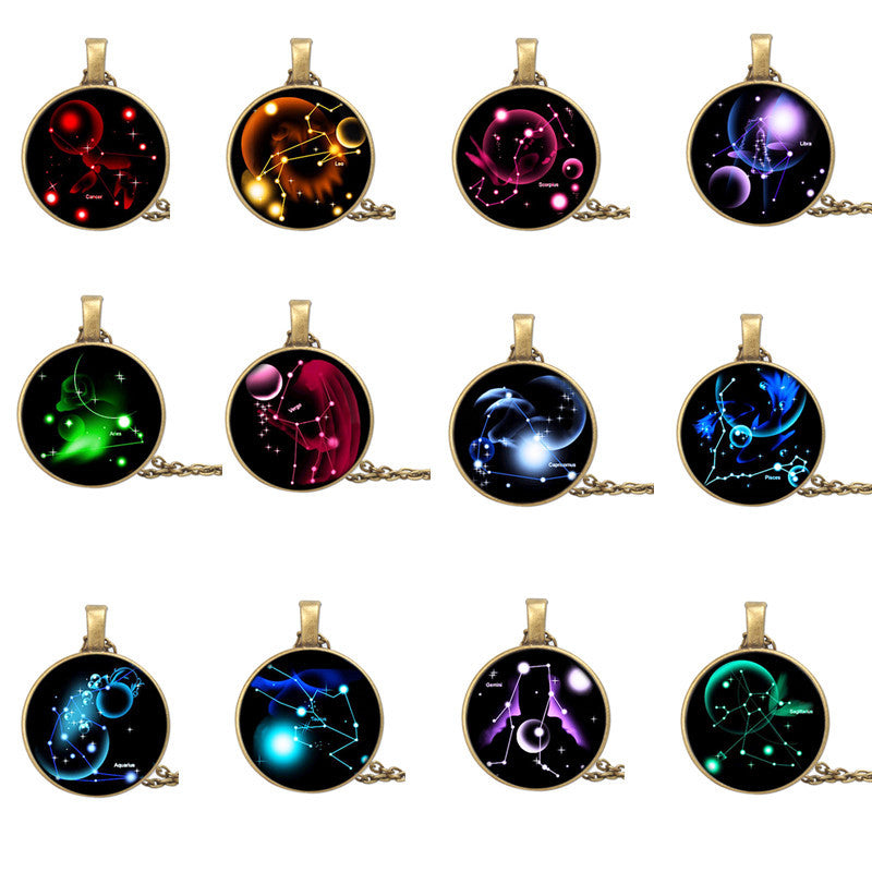 Collection of celestial-themed pendants on a white background
