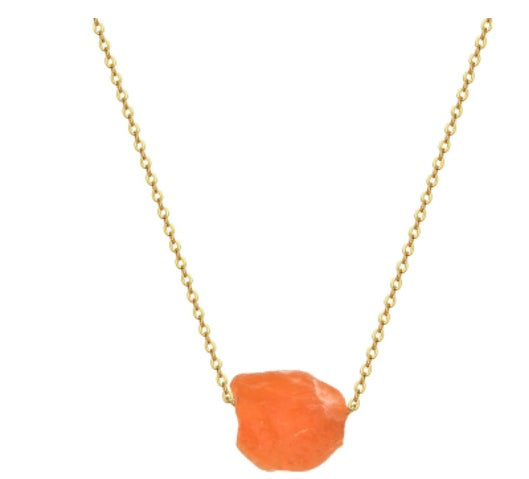 Necklace with a orange stone pendant on a gold chain against a white background