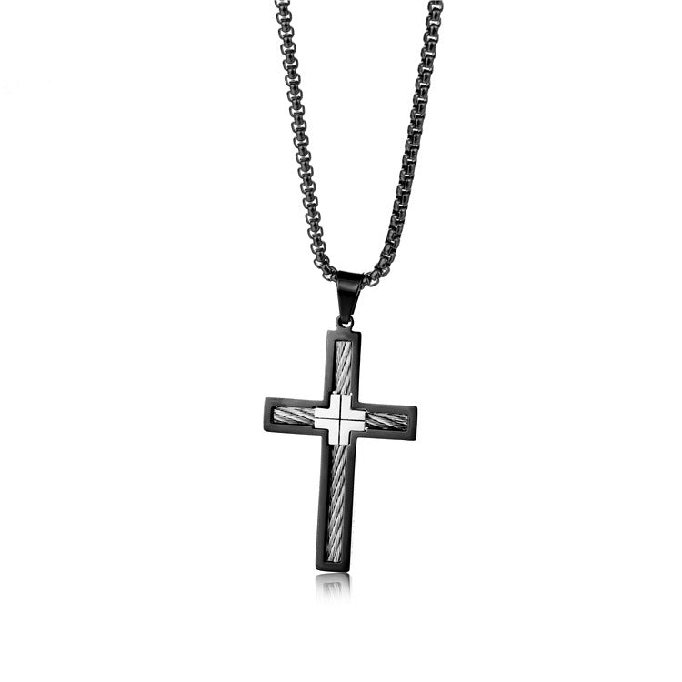 Black cross pendant necklace on a white background