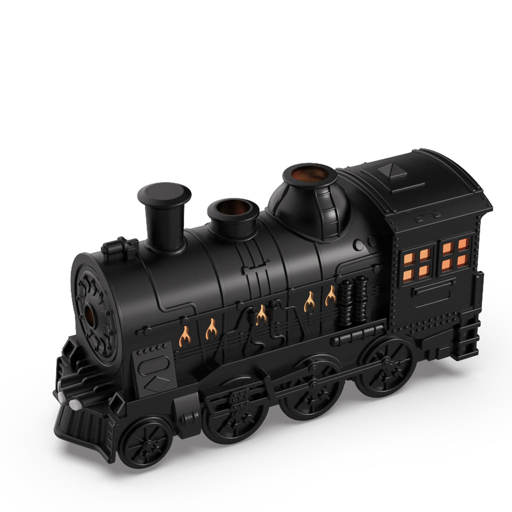 Black toy train engine on a white background