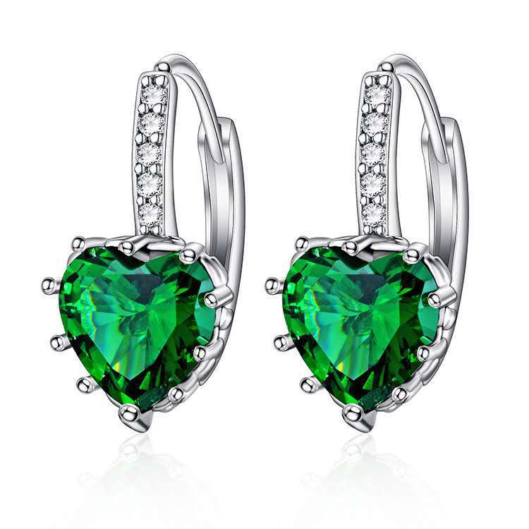 Heart-shaped green gemstone earrings with silver accents on a white background