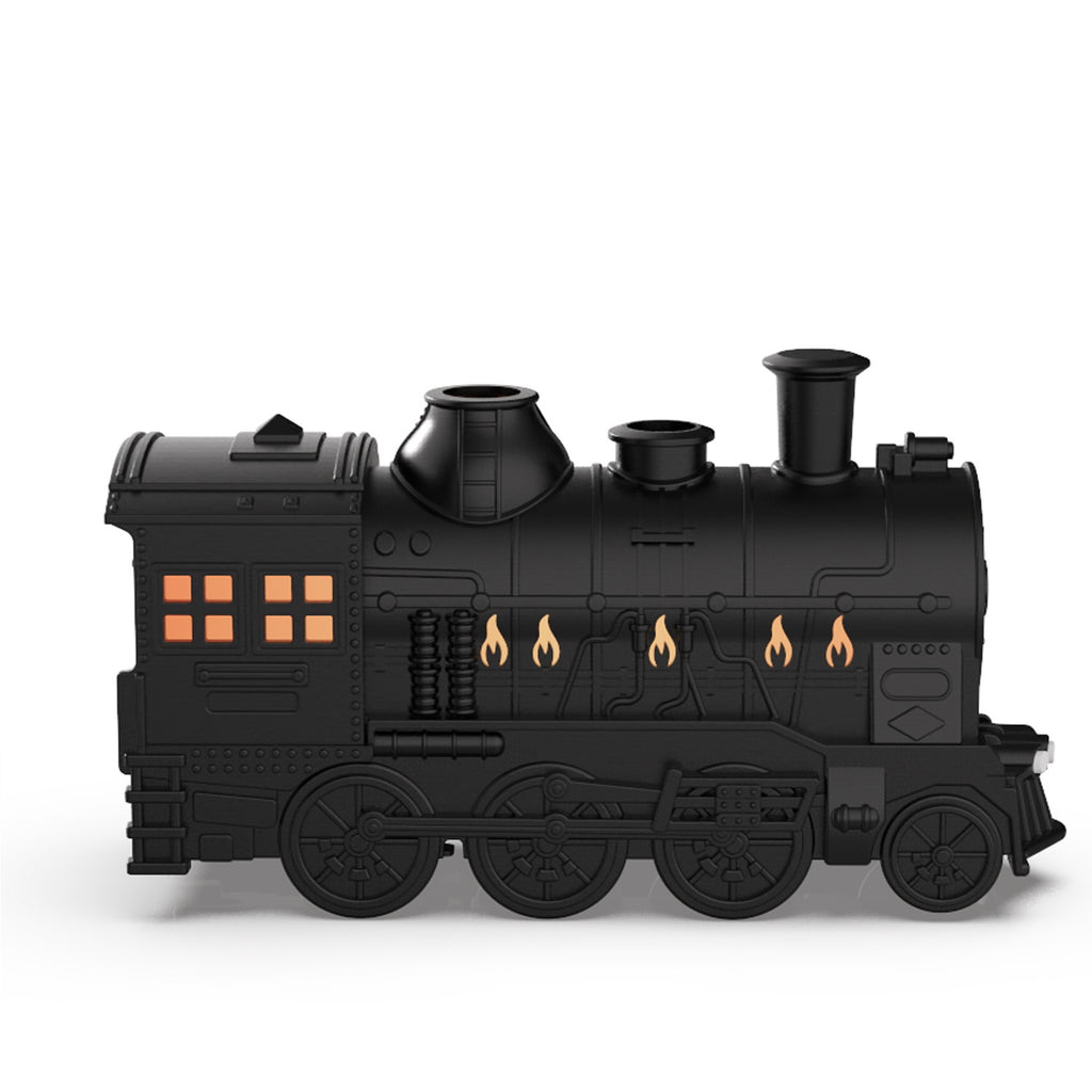 Black toy train engine on a white background
