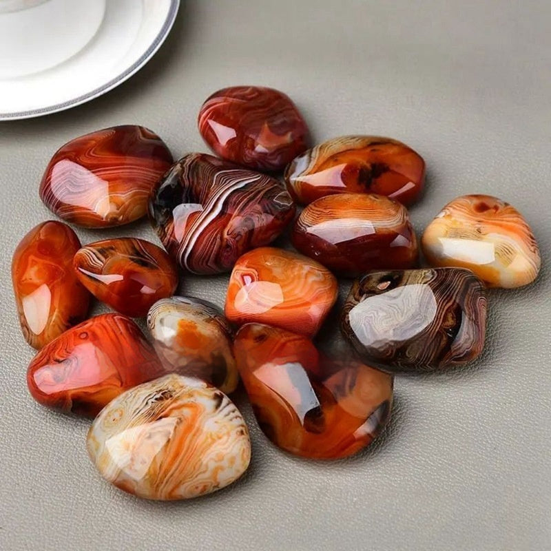 Collection of marbled stones on a gray surface