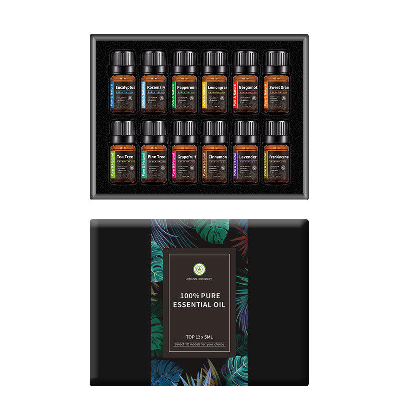 Set of 12 small essential oil bottles in a black box with a decorative label.