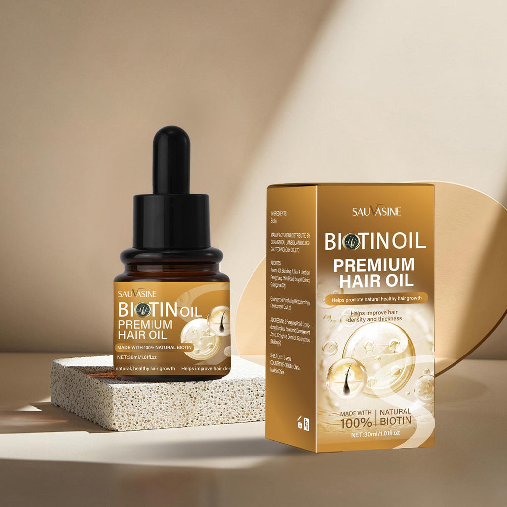 Biotinoil premium hair oil bottle and packaging on a neutral background