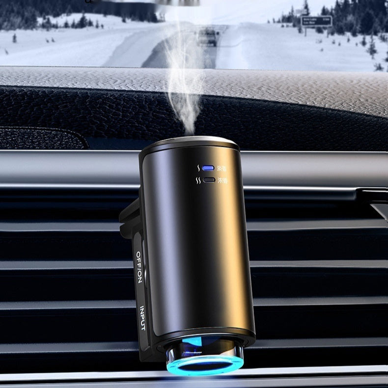 Car humidifier emitting steam into a car's interior with a snowy landscape outside.