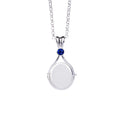 Silver necklace with a round pendant featuring a blue gemstone on a white background
