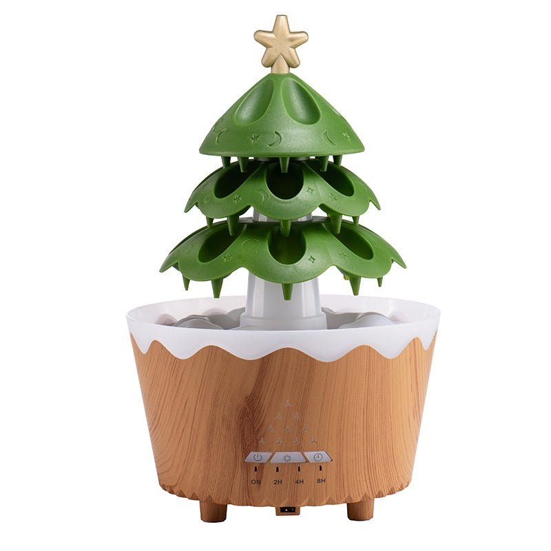 Decorative Christmas tree-shaped diffuser with wooden base on a white background