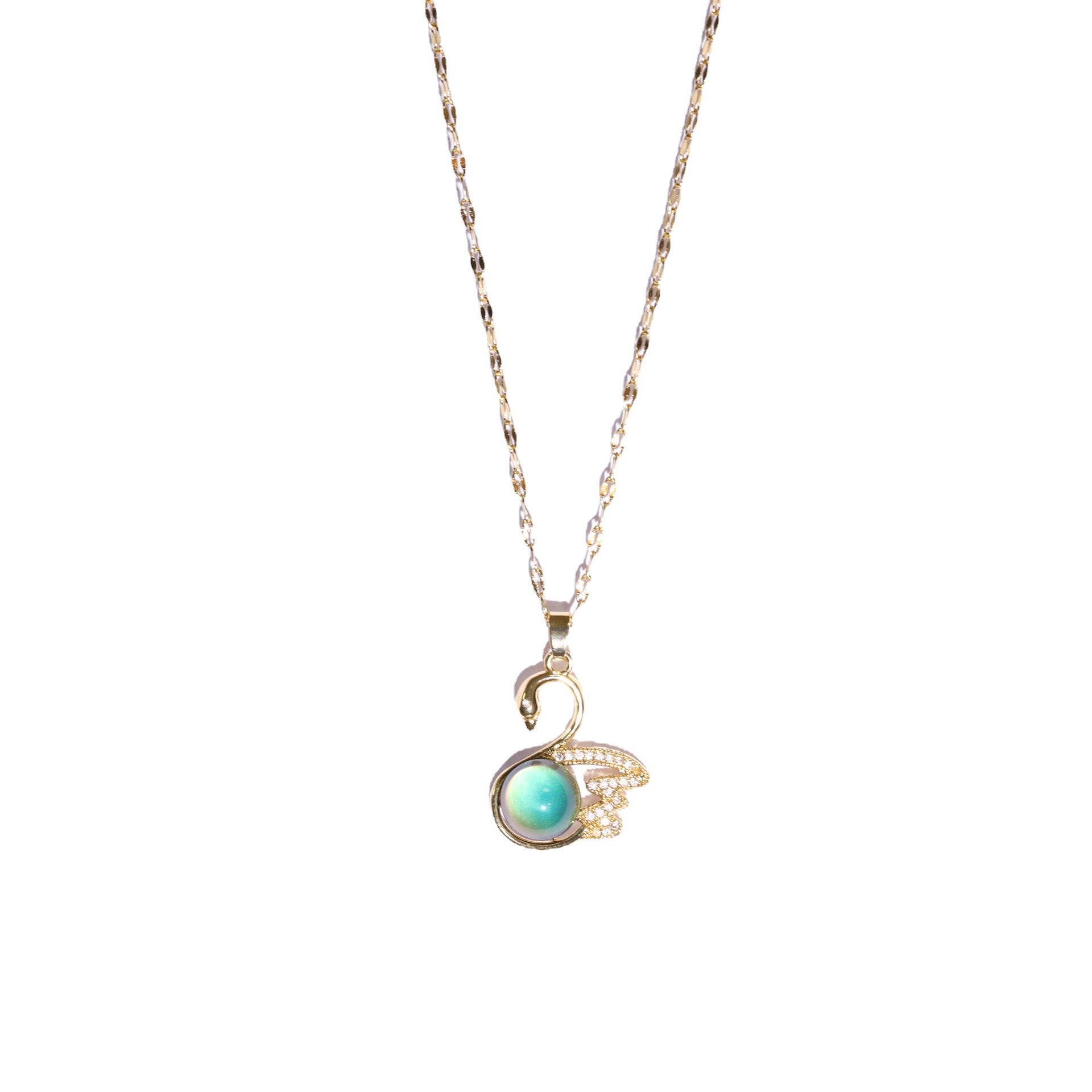 Necklace with a pendant featuring a green gemstone on a white background