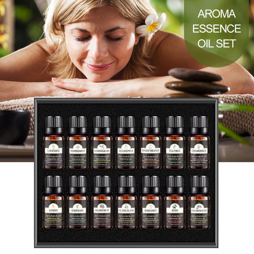 Aroma essence oil set with a woman enjoying a massage in the background