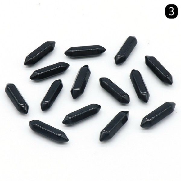 Black crystal points on a white background