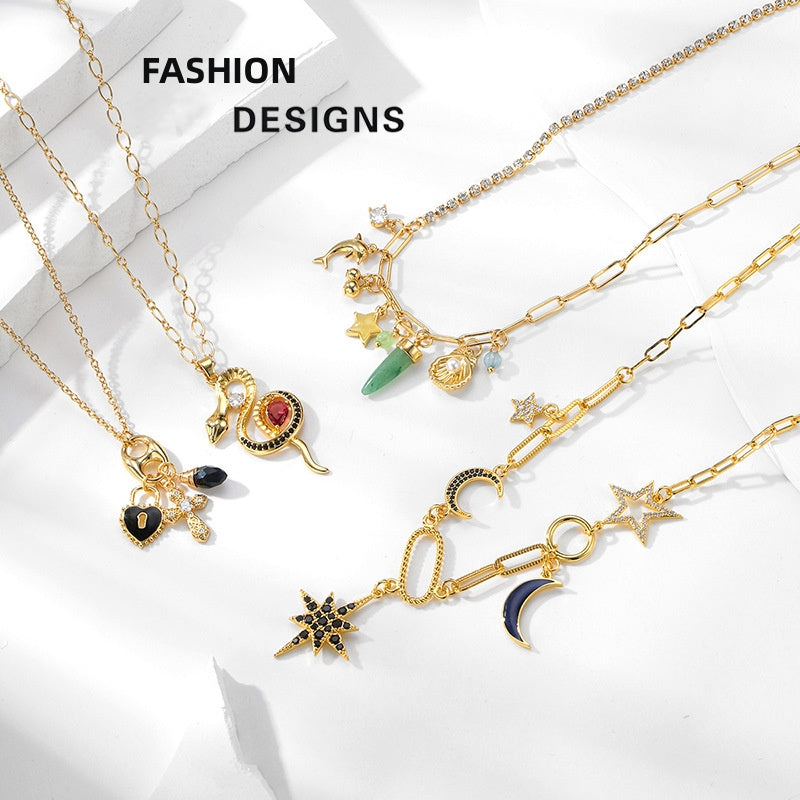 Gold necklaces with various charms on a white background, labeled 'Fashion Designs'.