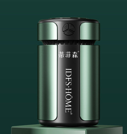 Green and black device with 'IDES HOME' branding on a green background
