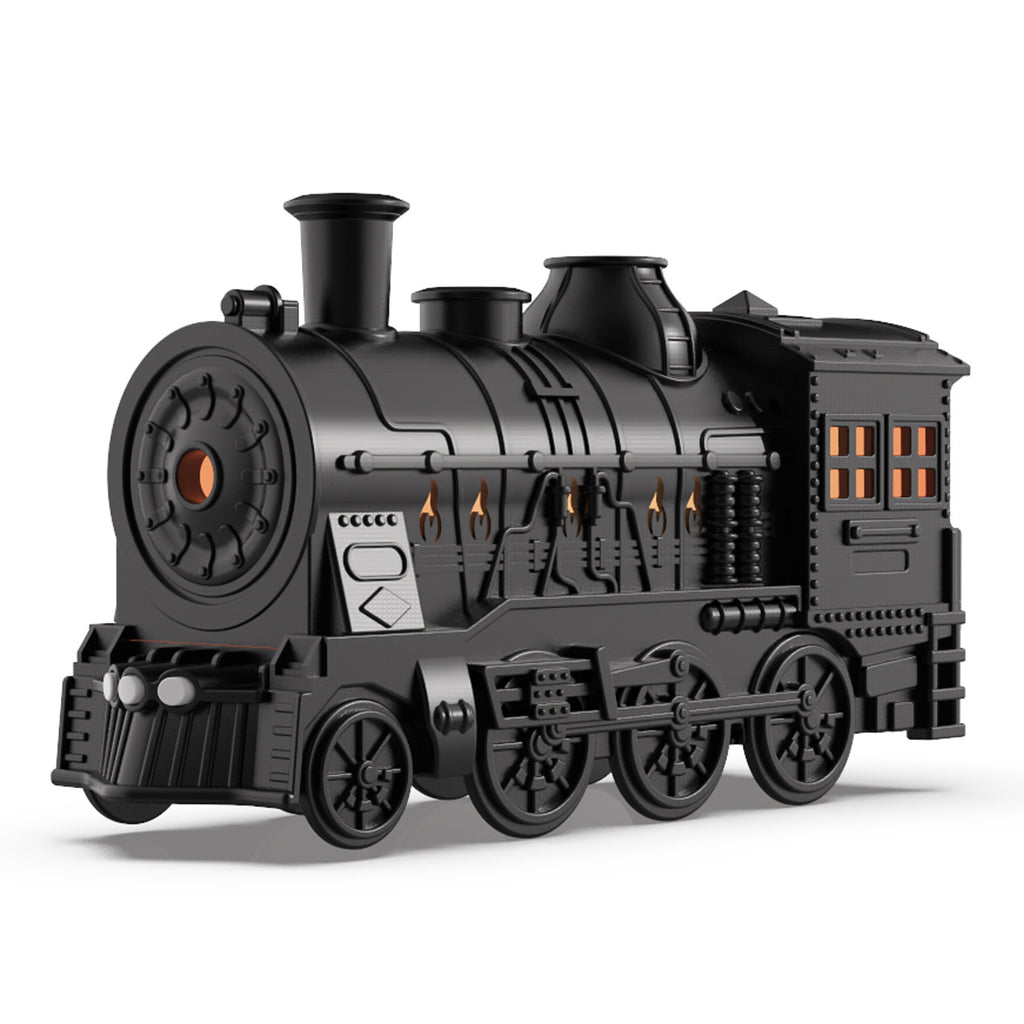 Black toy steam locomotive on a white background
