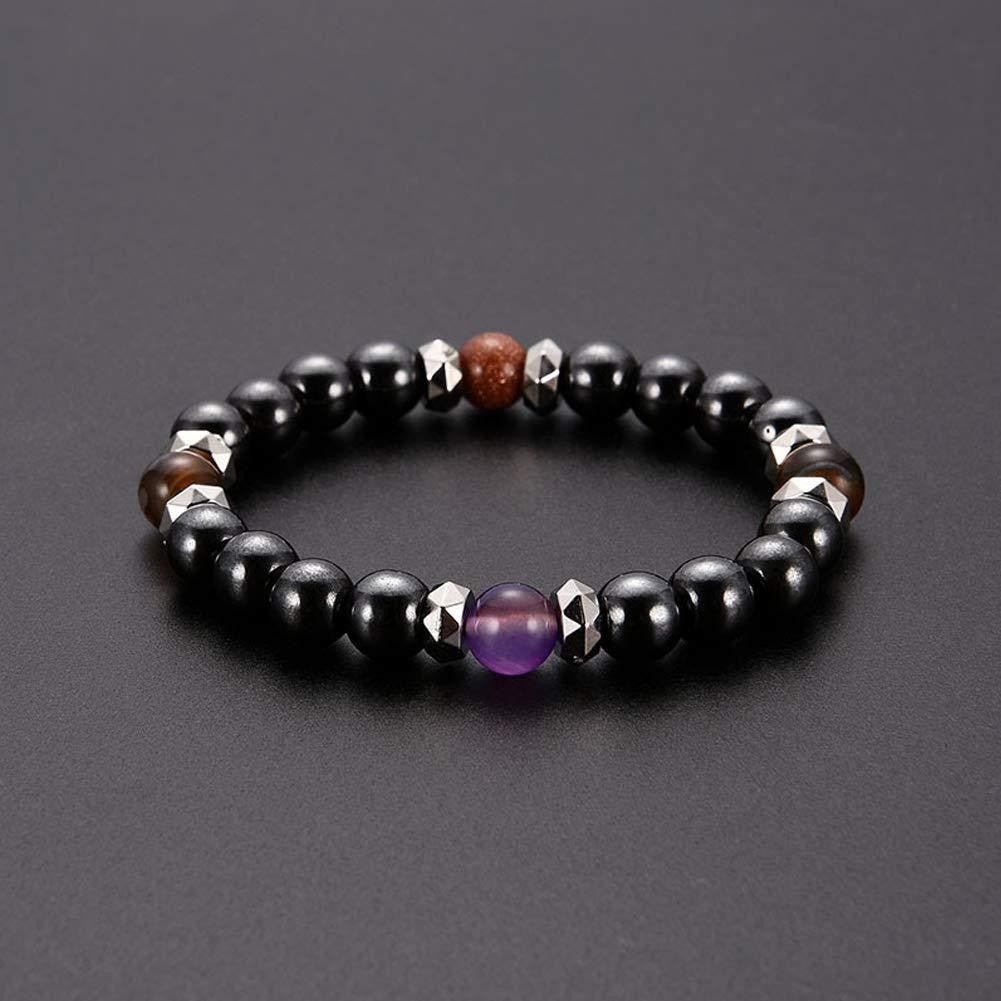 Black beaded bracelet with purple gemstone on a dark gray background