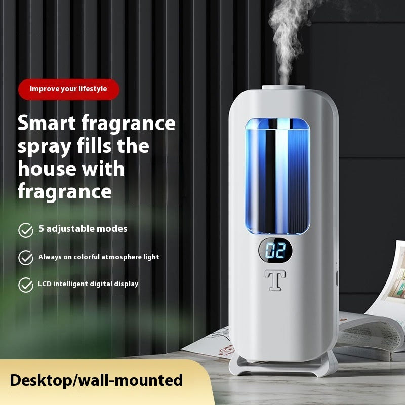 Smart fragrance spray device with digital display on a table, featuring text about its features.